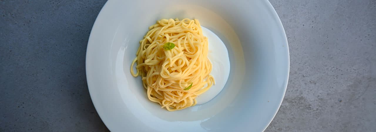 Butter Tajarin with Parmigiano fondue (black or white truffle option)